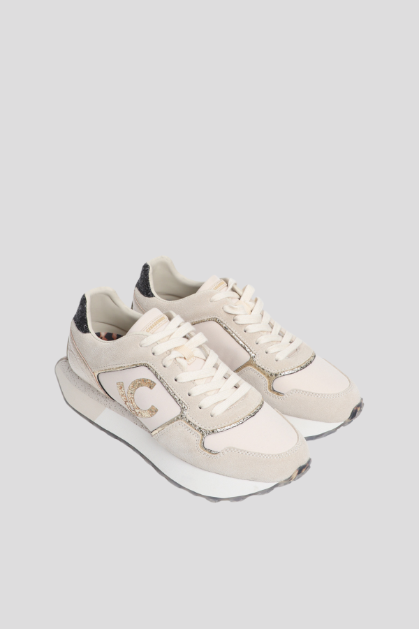 Sporty combination in different materials and leat